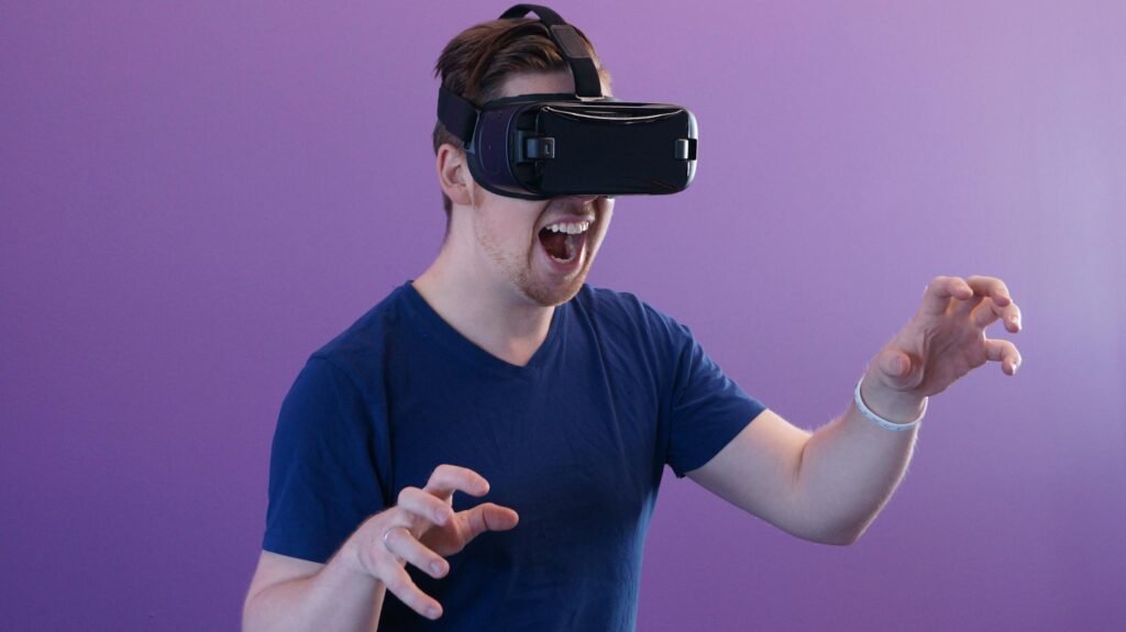 Man Wearing Black Virtual Reality Goggles